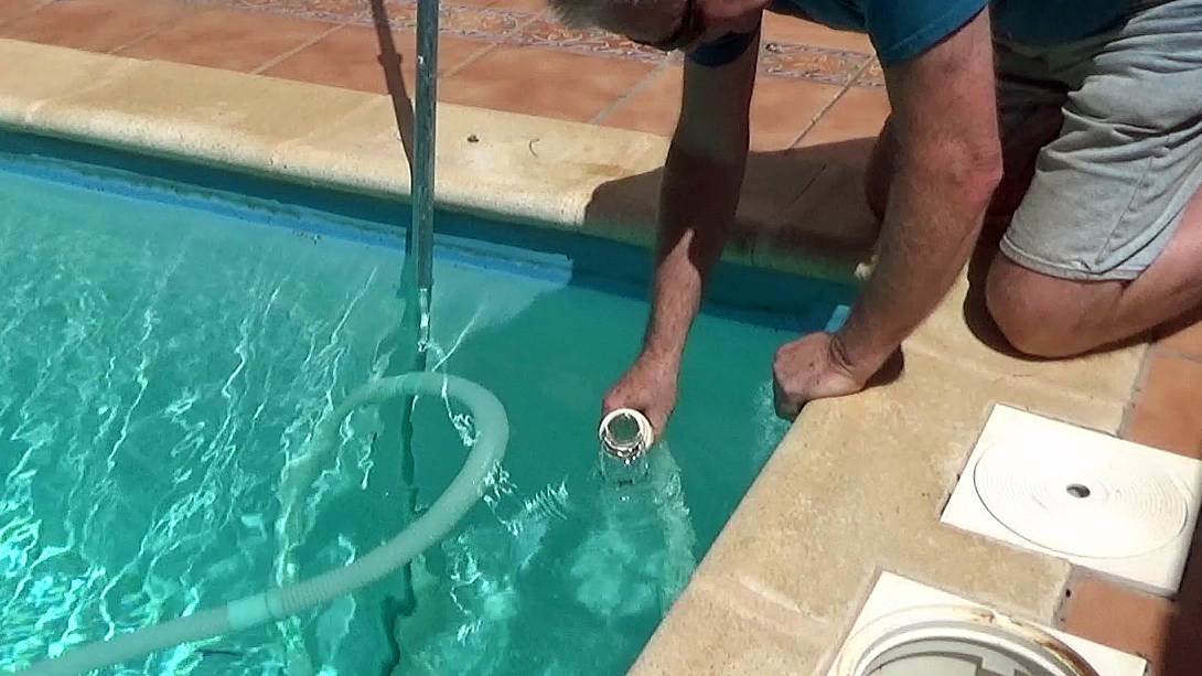 removing air from a pool hose