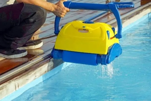 You do not need to remove the skimmer basket when using a robotic pool cleaner