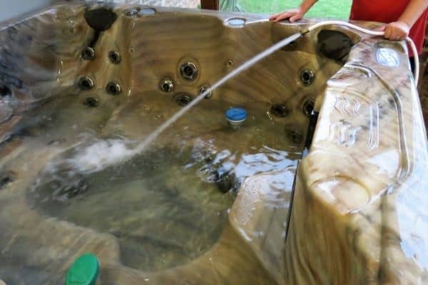 how to get rid of foam in hot tub