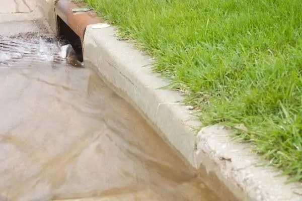 Can you backwash into the street or storm drain