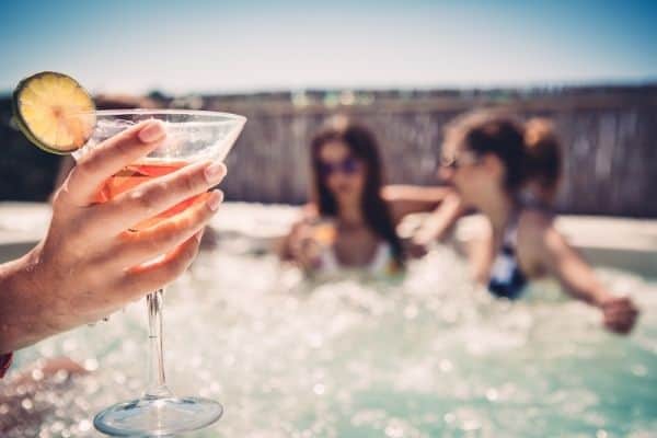 Hot tub party - How often should I shock my hot tub