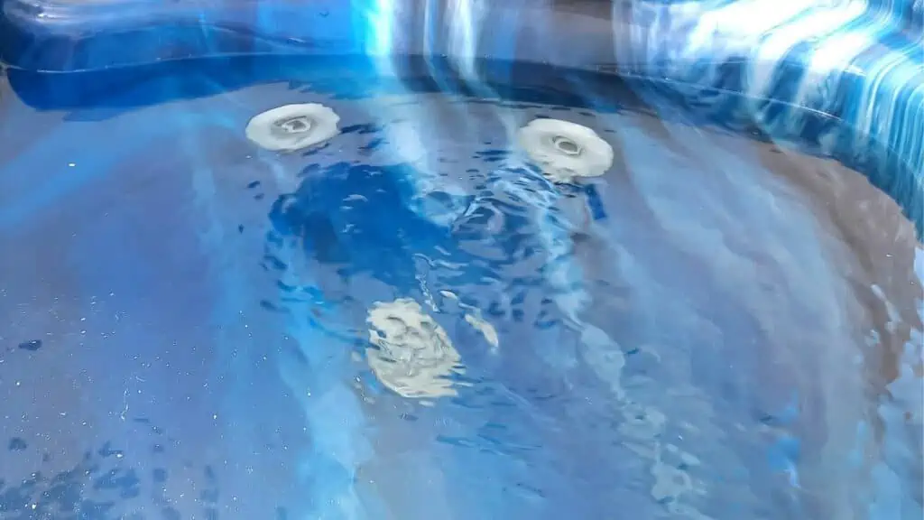 What happens if hot tub water is too high