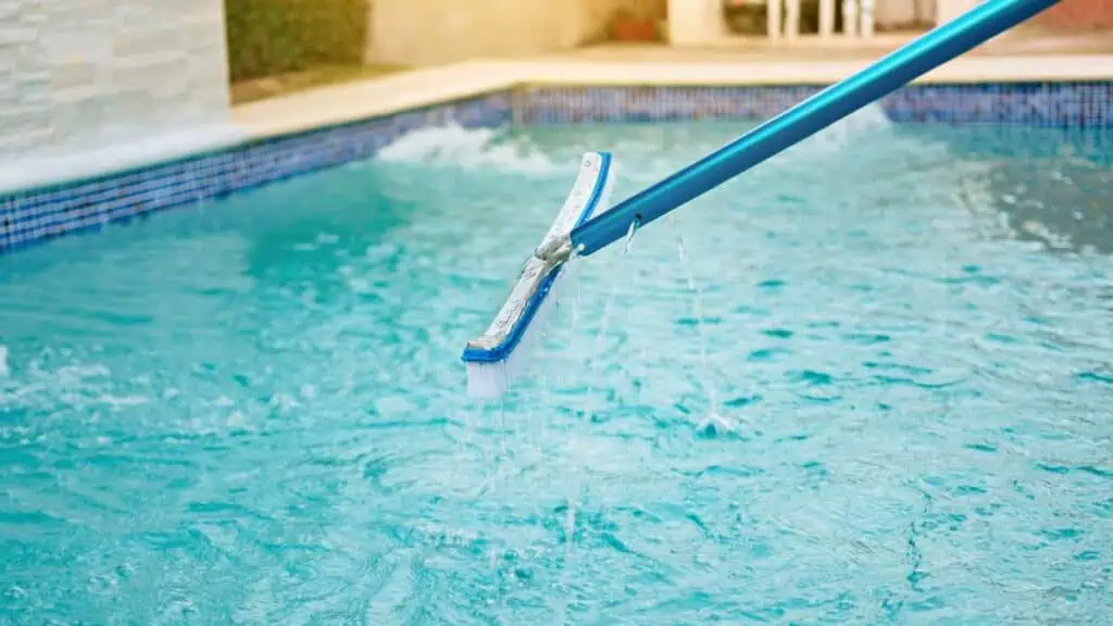 Can You Use Bleach to Shock a Pool - brushing