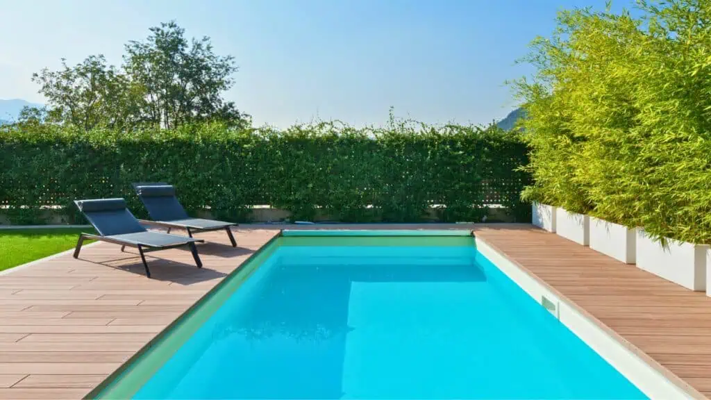 A very clean looking private pool with sunbeds