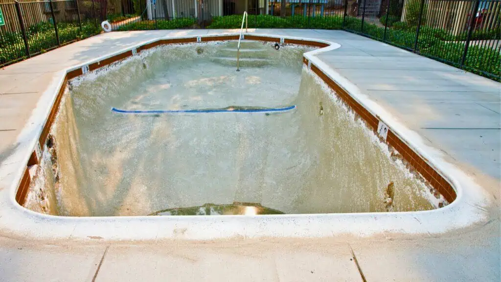 empty damaged concrete pool
